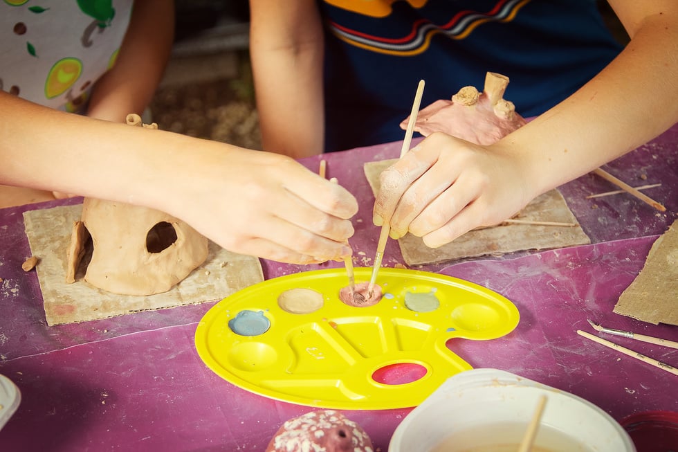 Kid Playing with Clay